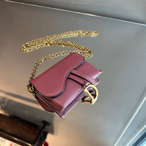 nano pochette saddle dior|dior saddle bag chain.